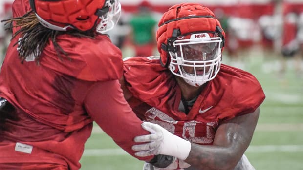 Razorbacks defensive end Eric Gregory at practice Monday afternoon indoors to beat the heat